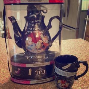 Alice and wonderland tea cup and kettle